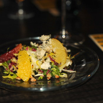 Bitter greens with citrus fruits